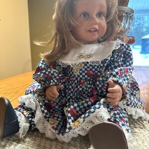 Floral Patterned Doll with Blue Dress